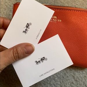 Coach Accessories - NWOT Coral Coach Wristlet